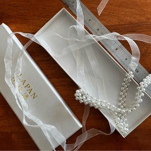 Delicate pearl beaded ribbon belt